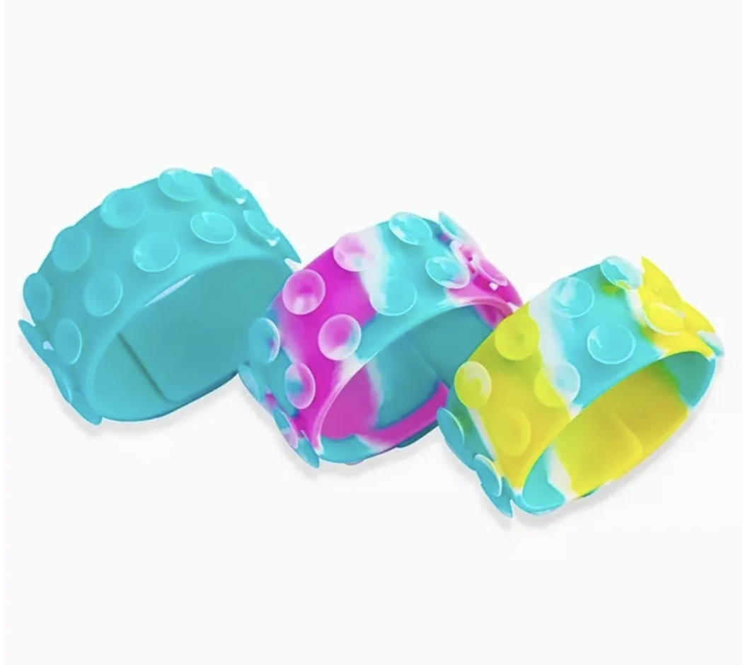 Chewable oral sensory wristband for regulation and focus.